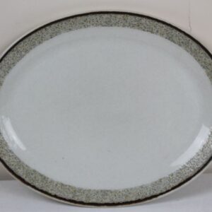 green and white patterned china plate