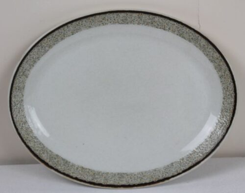 green and white patterned china plate