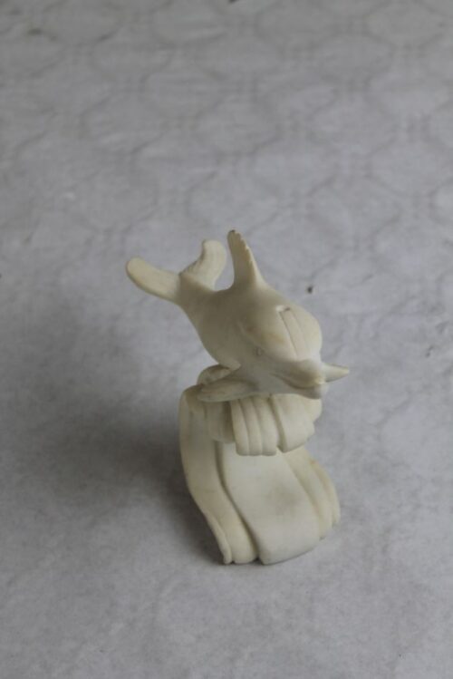 cream stone dolphin ornament