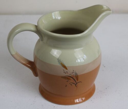 small ceramic water jug