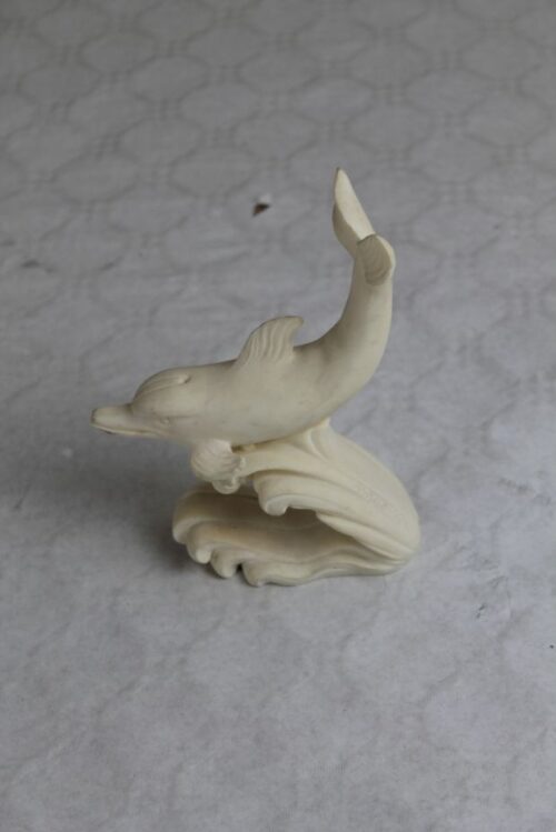 cream stone dolphin ornament