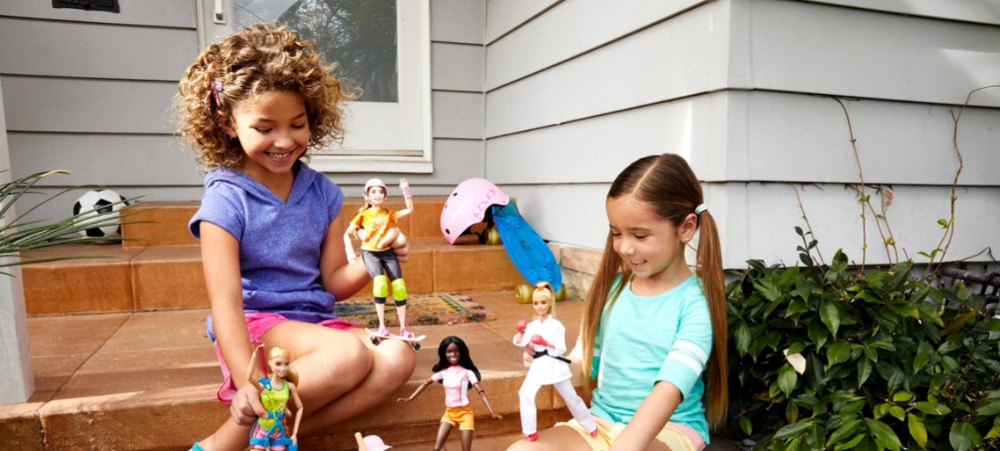 Children playing with dolls